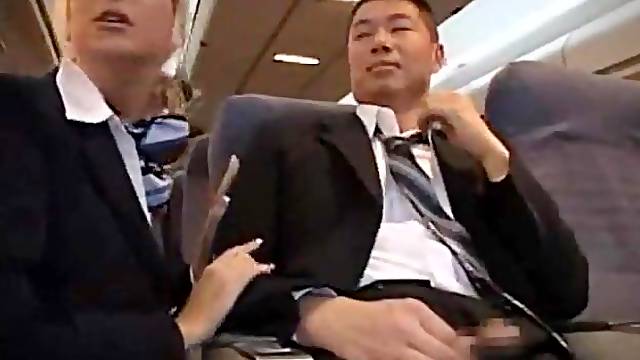 Sexy Stewardess Gives Handjob