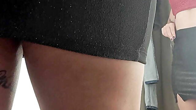 Trying on mini skirts in the store showing my ass without panties