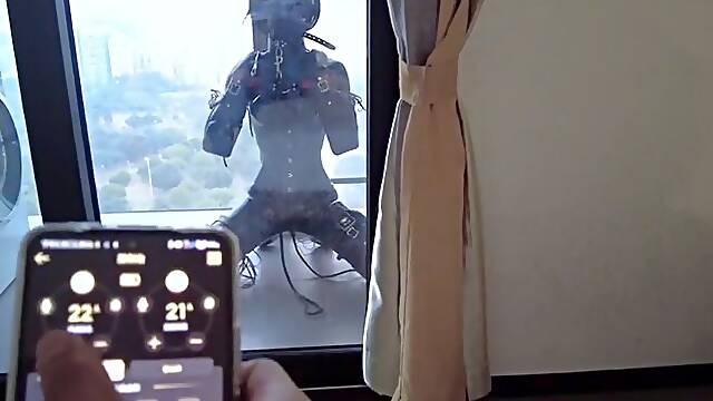 A puppy in leather bondage—an extremely strict restraint setup. Inflatable gag, inflatable anal plug, and continuous inflation.